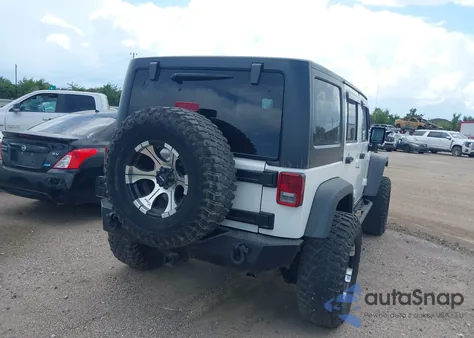 2011 Jeep Wrangler Unlimited Rubicon из США, поврежденный, VIN 1J4BA6H10BL536027